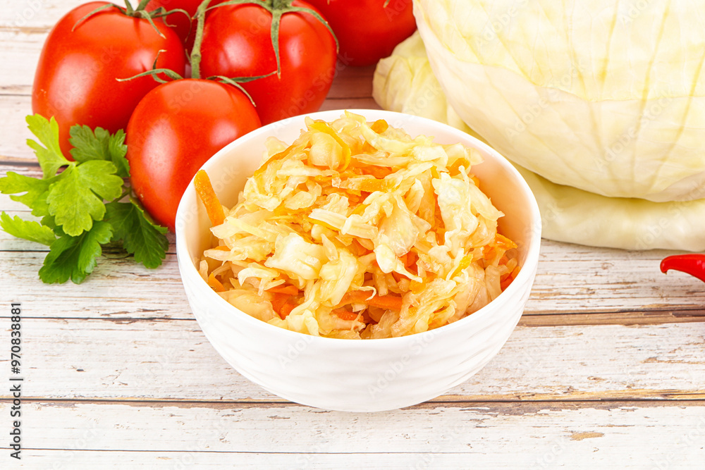 Fermented cabbage sauerkraut in the bowl Fermented cabbage sauerkraut in the bowl