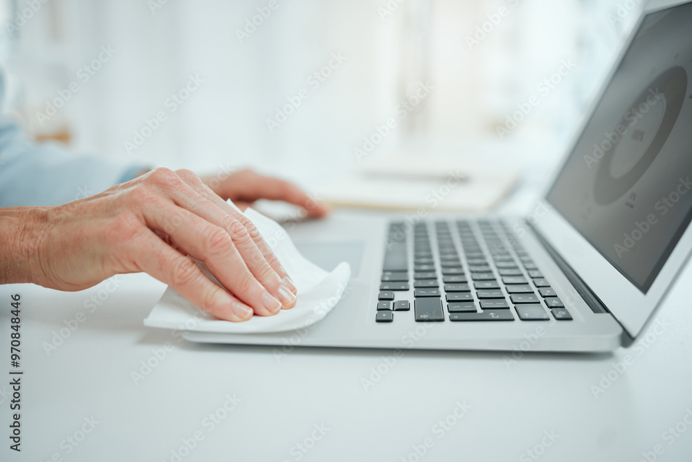 Hands, tissue and person wipe laptop for sanitizing, hygiene or healthcare routine in office. Technology, disinfection and closeup of employee clean computer for dirt, germs or bacteria in workplace. Hands, tissue and person wipe laptop for sanitizing, hygiene or healthcare routine in office. Technology, disinfection and closeup of employee clean computer for dirt, germs or bacteria in workplace.