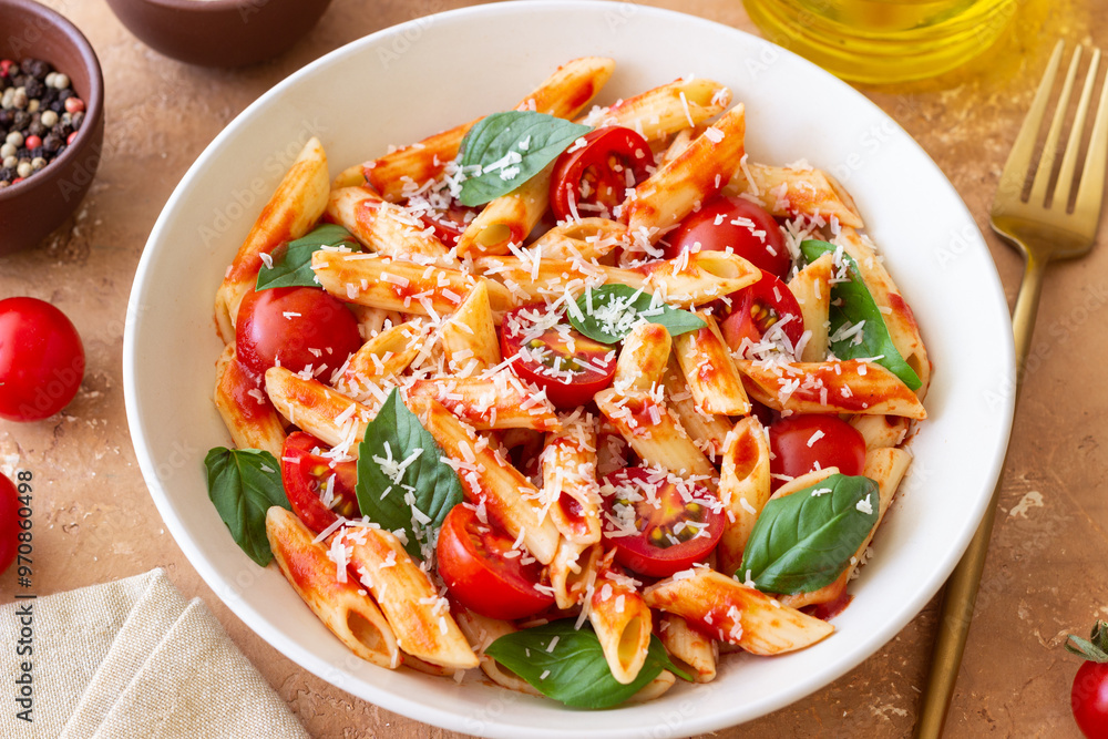 Pasta penne alla arrabiata with tomatoes, basil and parmesan cheese. Healthy Eating. Vegetarian Food. Pasta penne alla arrabiata with tomatoes, basil and parmesan cheese. Healthy Eating. Vegetarian Food.
