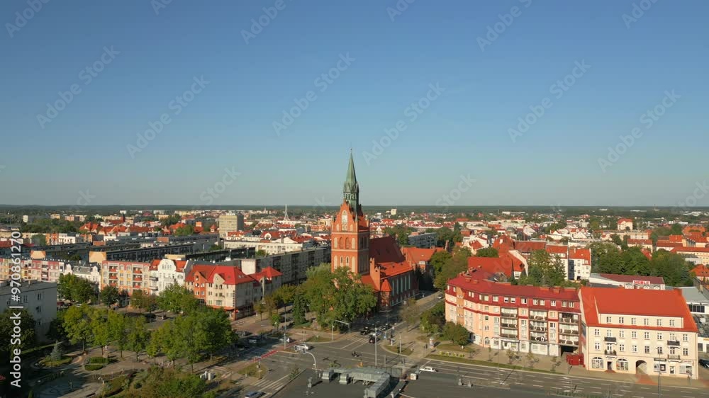 Church of the Most Sacred Heart of Jesus in beautiful European town of Elk, Elk main street square traffic and city buildings, Drone shot Church of the Most Sacred Heart of Jesus in beautiful European town of Elk, Elk main street square traffic and city buildings, Drone shot