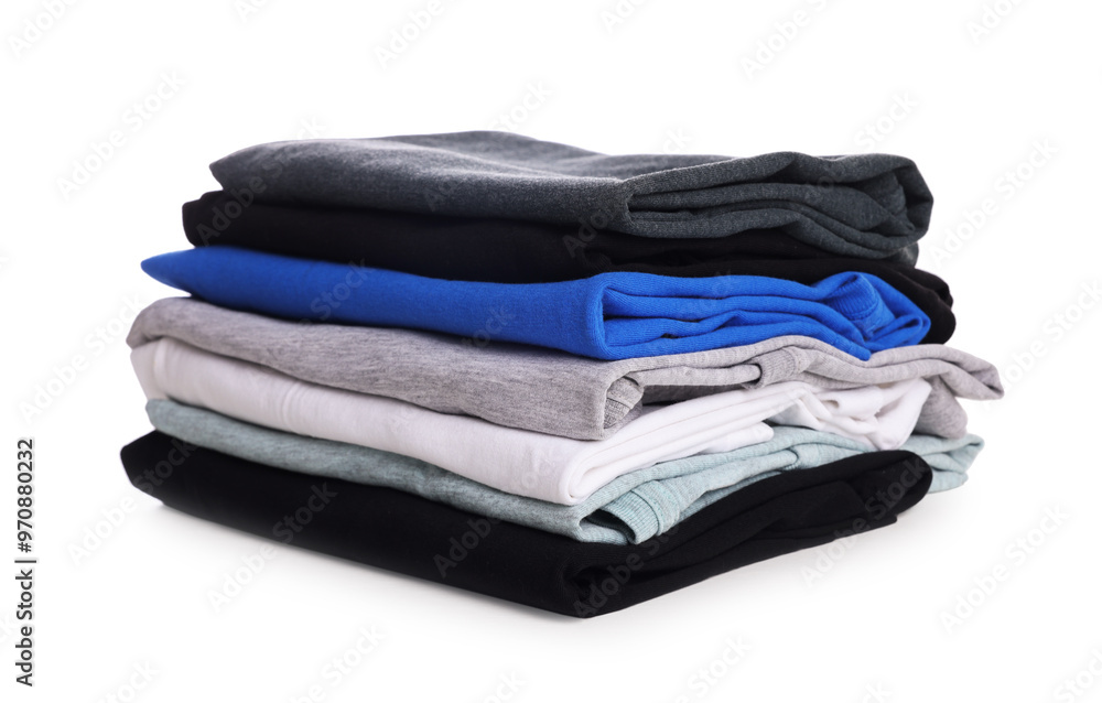 Stack of clean colorful t-shirts isolated on white Stack of clean colorful t-shirts isolated on white
