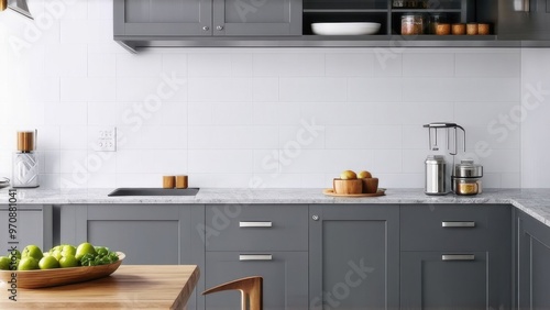 Front view of elegant interior with gray drawers under kitchen cabinet. empty wooden table and marble countertop in room. modern equipment for cooking. well organized space for storage food products