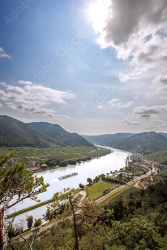 Photography Wild nature of Wachau Valley (Unesco world heritage site) with boat on Danube ri