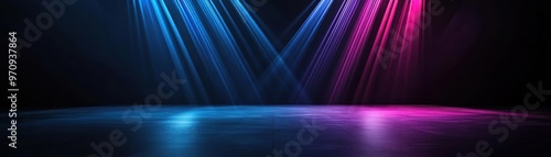 A vibrant stage setup featuring blue and pink lights, perfect for concerts, performances, or artistic presentations.