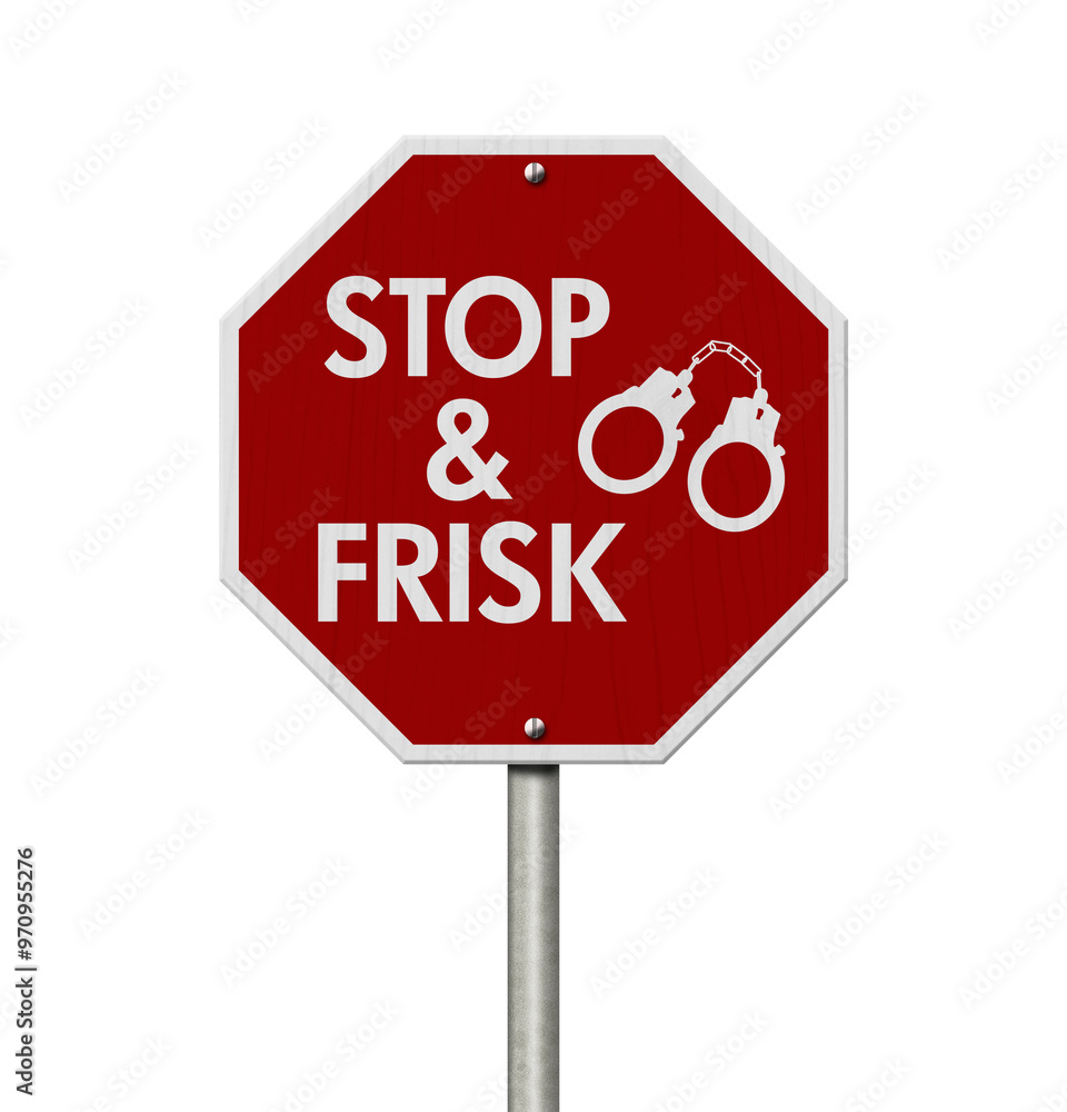 Stop and Frisk message with handcuffs on red street stop sign Stop and Frisk message with handcuffs on red street stop sign