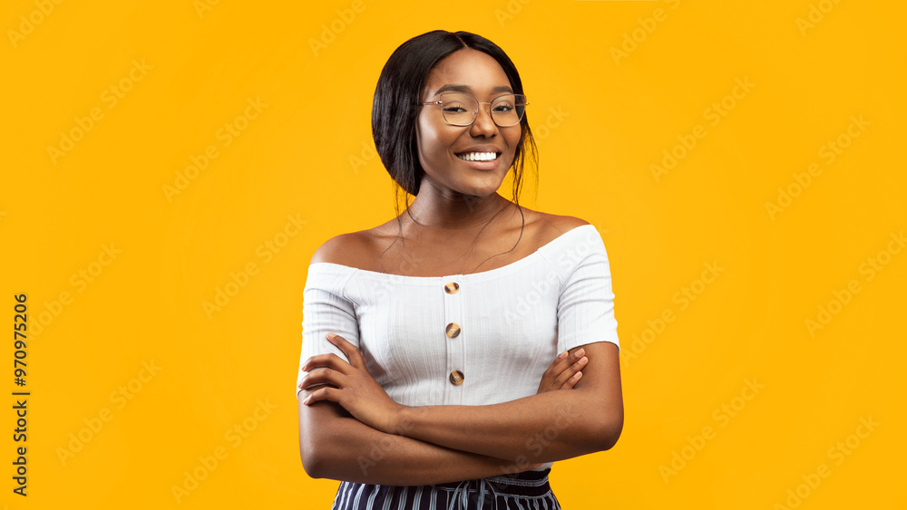 Obraz premium Cheerful African American Girl Crossing Hands Smiling At Camera Standing In Studio On Orange Background. Panorama
