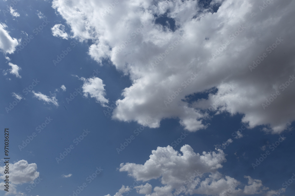 Fototapeta premium sky, cloud, clouds, blue, nature, white, weather, cloudscape, air, heaven, day, cloudy, fluffy, atmosphere, sun, summer, light, skies, cumulus, sunny, meteorology, bright, wind, clear, landscape