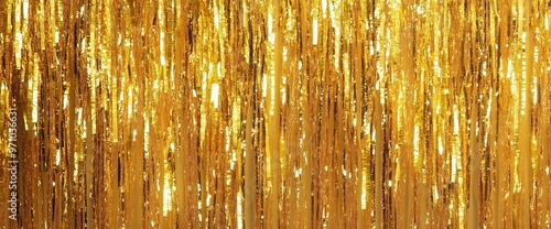 Golden foil fringed curtain - glittering backdrop for celebrations and events design photo