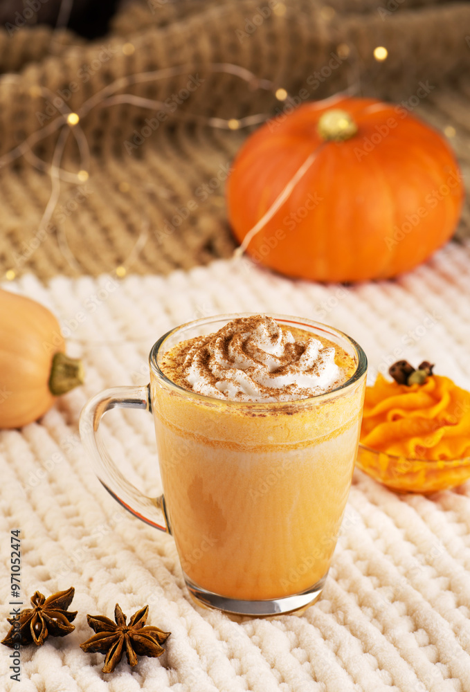 Pumpkin spice latte with whipped cream and ingredients. Pumpkin spice latte with whipped cream and ingredients.