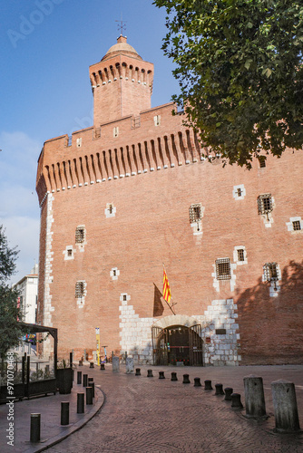 Perpignan, France - 27 Aug, 2024: Castillet tower hosting a museum of history and culture photo