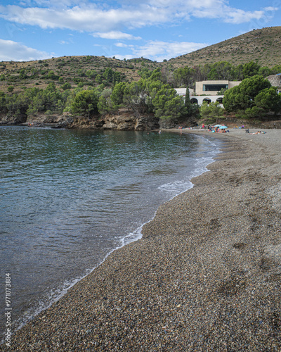 Фотография Girona, Spain - 9 August, 2024: Views of El Bulli restaurant from the beach of C