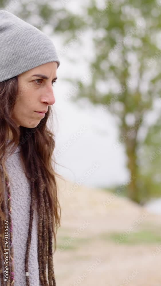 Angry young woman shouting out loud in nature. Anger and impotence concept Angry young woman shouting out loud in nature. Anger and impotence concept