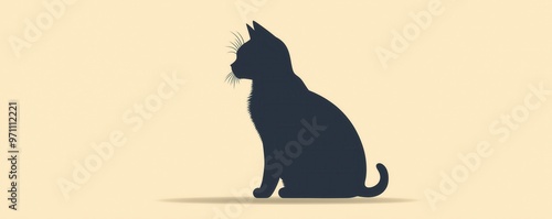 Elegant silhouette of a cat sitting against a soft background, perfect for pet lovers and animal-themed designs. photo