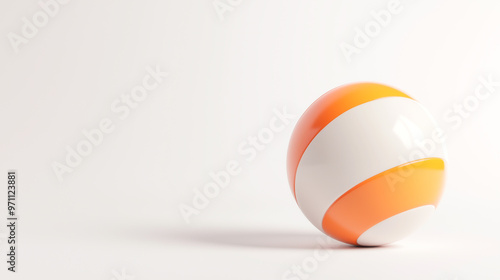 A vibrant orange and white striped ball resting on a clean surface, perfect for playful and fun-themed projects.