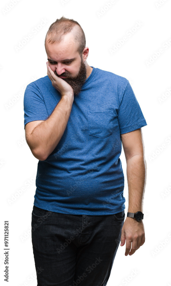 Young caucasian hipster man over isolated background thinking looking tired and bored with depression problems with crossed arms. Young caucasian hipster man over isolated background thinking looking tired and bored with depression problems with crossed arms.