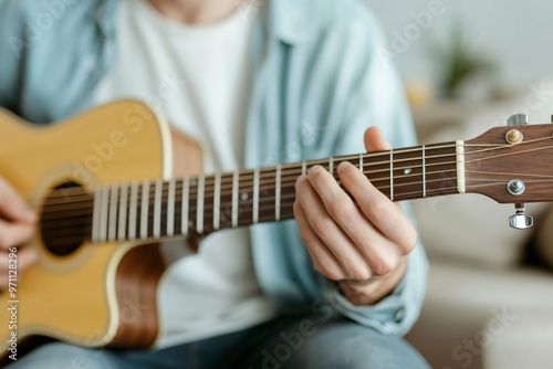 Man playing the guitar in a serene living room, soft melodies filling the air, relax hobby