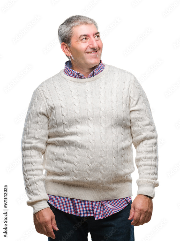 Handsome senior man wearing winter sweater over isolated background looking away to side with smile on face, natural expression. Laughing confident. Handsome senior man wearing winter sweater over isolated background looking away to side with smile on face, natural expression. Laughing confident.
