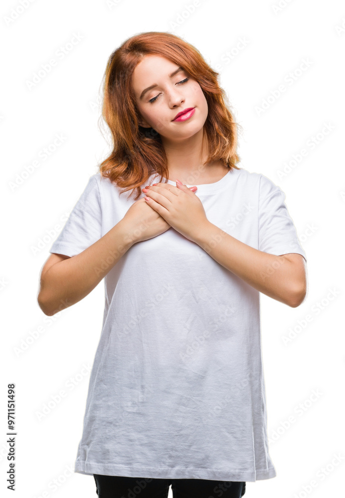 Young beautiful woman over isolated background smiling with hands on chest with closed eyes and grateful gesture on face. Health concept. Young beautiful woman over isolated background smiling with hands on chest with closed eyes and grateful gesture on face. Health concept.
