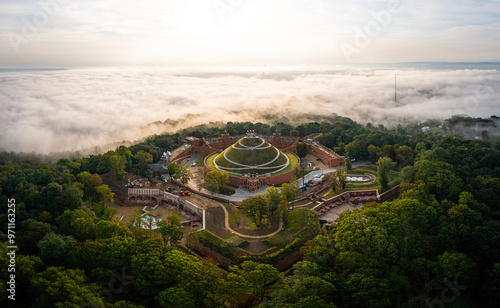 Aerial view of Kosciuszko Mound in autumn, foggy morning in Krakow, Poland