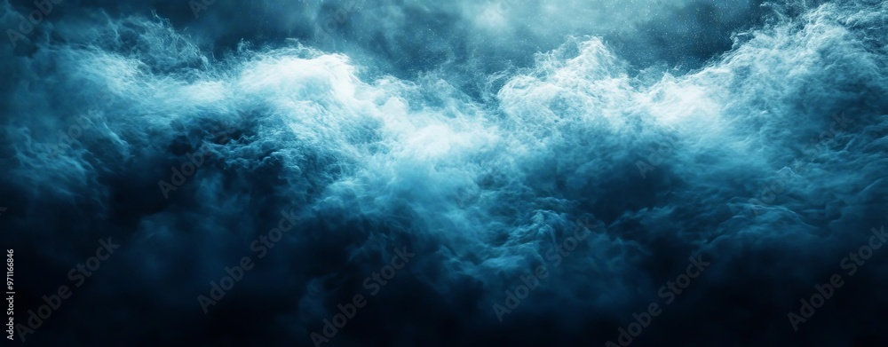 Obraz premium Dark blue and black abstract texture with hints of mist and fog, capturing the depth and mystery of the ocean or a night sky The image should be rich and immersive