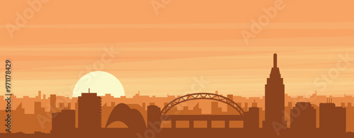 Brown panoramic poster of the city skyline with misty background buildings, sunrise, clouds and mountains of NEWCASTLE, UNITED KINGDOM