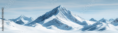 Snow-covered mountain peaks under a clear blue sky. A breathtaking winter landscape perfect for nature, travel, and adventure. Pristine and serene.