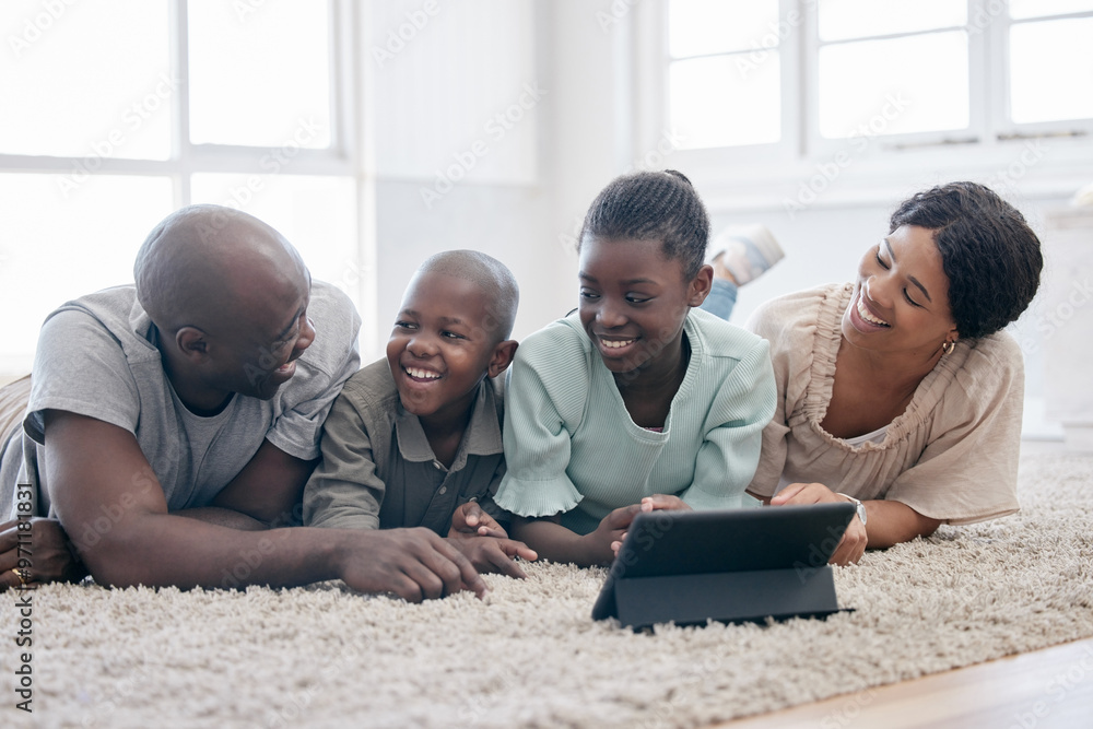 African family, smile and relax with tablet on floor in home for learning, meme or funny conversation. Mother, father and kids on carpet with technology for streaming cartoon, movie or people laugh African family, smile and relax with tablet on floor in home for learning, meme or funny conversation. Mother, father and kids on carpet with technology for streaming cartoon, movie or people laugh