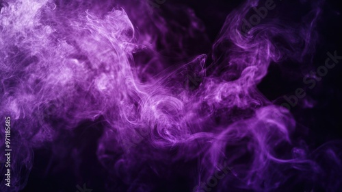 A close-up of purple smoke swirling against a black background, creating a mysterious and abstract effect