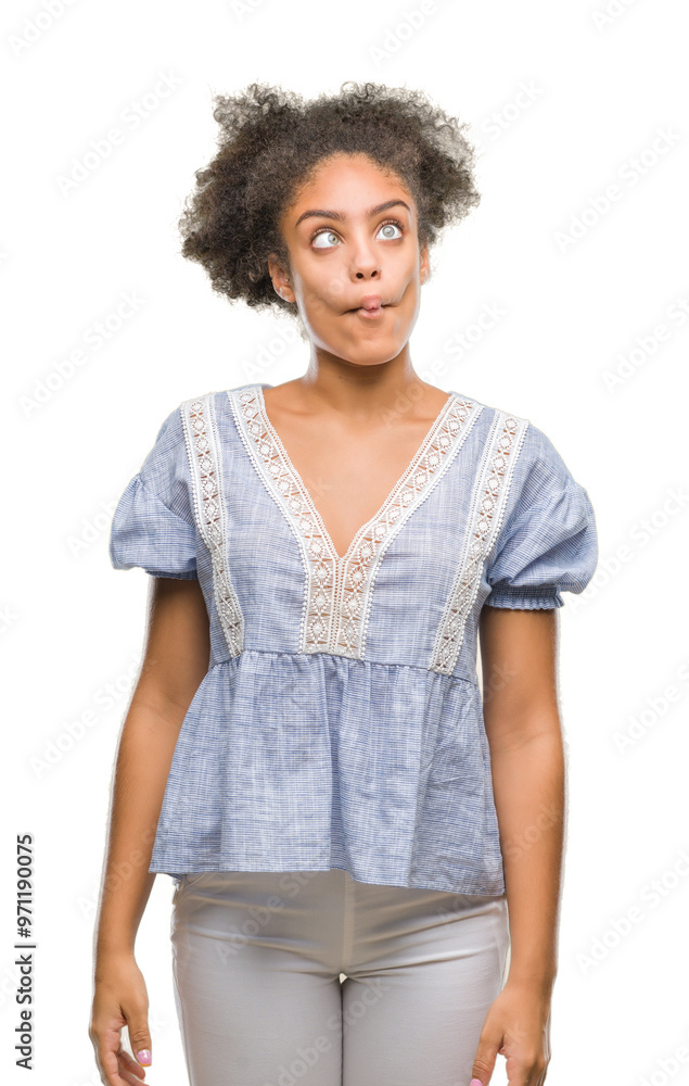 Young afro american woman over isolated background making fish face with lips, crazy and comical gesture. Funny expression. Young afro american woman over isolated background making fish face with lips, crazy and comical gesture. Funny expression.