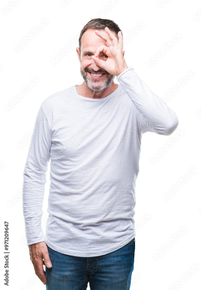 Middle age hoary senior man wearing white t-shirt over isolated background doing ok gesture with hand smiling, eye looking through fingers with happy face. Middle age hoary senior man wearing white t-shirt over isolated background doing ok gesture with hand smiling, eye looking through fingers with happy face.