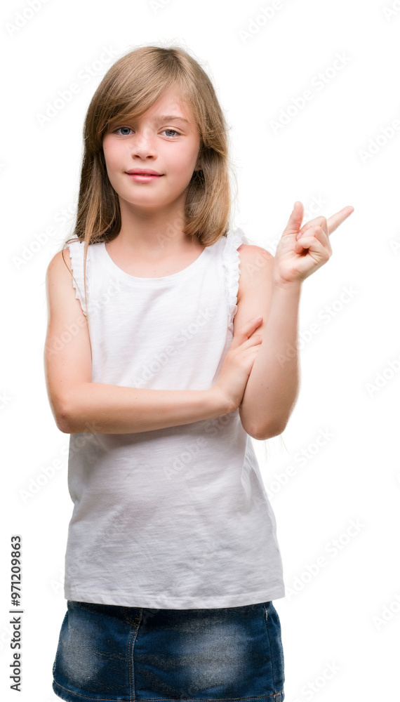 Young blonde toddler very happy pointing with hand and finger to the side Young blonde toddler very happy pointing with hand and finger to the side