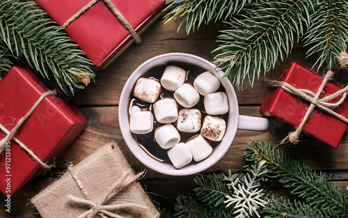 Hot cocoa with marshmallows, red gift boxes with white ribbons, rustic wooden table, cozy holiday setting photo