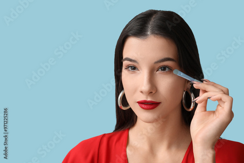 Beautiful young woman with ...