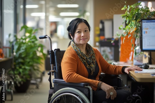 Inclusive Work Environment Excellence Showcasing a fully accessible workplace where a professional in a wheelchair performs her role with competence, highlighting inclusivity at its best. photo