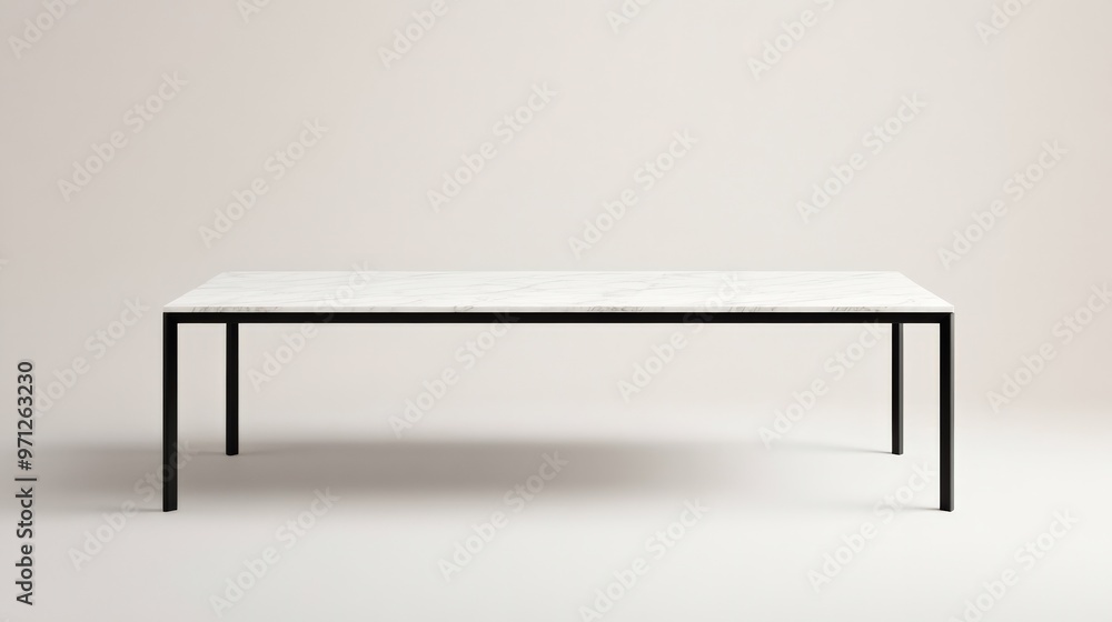Modern minimalist table with a sleek white surface and black metal legs, for contemporary decor and furniture design. Modern minimalist table with a sleek white surface and black metal legs, for contemporary decor and furniture design.