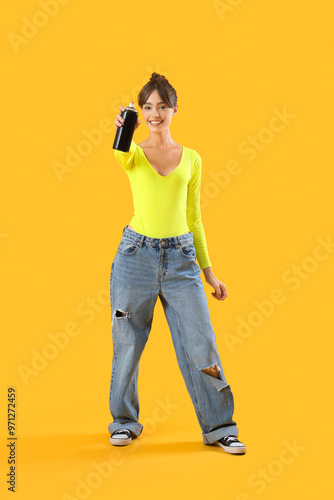 Cool young girl with spray ...