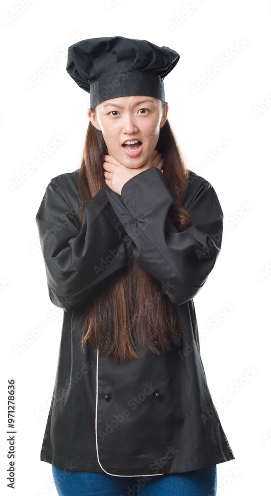 Young Chinese woman over isolated background wearing chef uniform shouting and suffocate because painful strangle. Health problem. Asphyxiate and suicide concept. Young Chinese woman over isolated background wearing chef uniform shouting and suffocate because painful strangle. Health problem. Asphyxiate and suicide concept.