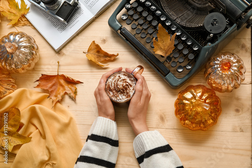 Female hands with cup of co...