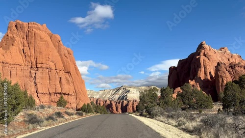 Stunning Kodachrome Basin State Park in Utah scenic point of view POV driving shot. The video captures the stunning red rock formations, blue skies, and desert landscape - USA