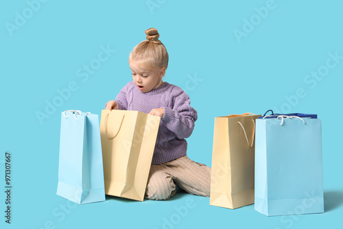 Cute little shocked girl in...