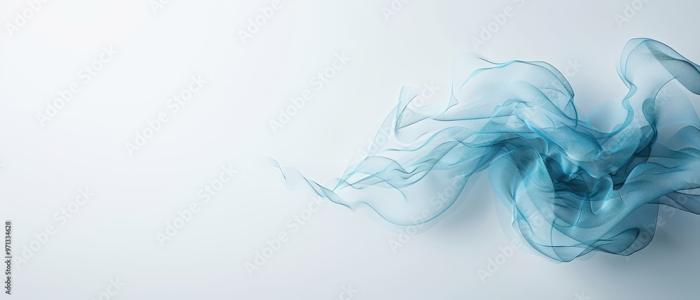 Flowing Aqua Fabric, a delicate blue gauze swirling gracefully against a soft white background, evokes tranquility and elegance, capturing movement and lightness. Flowing Aqua Fabric, a delicate blue gauze swirling gracefully against a soft white background, evokes tranquility and elegance, capturing movement and lightness.