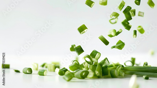 chopped green onions isolated on white