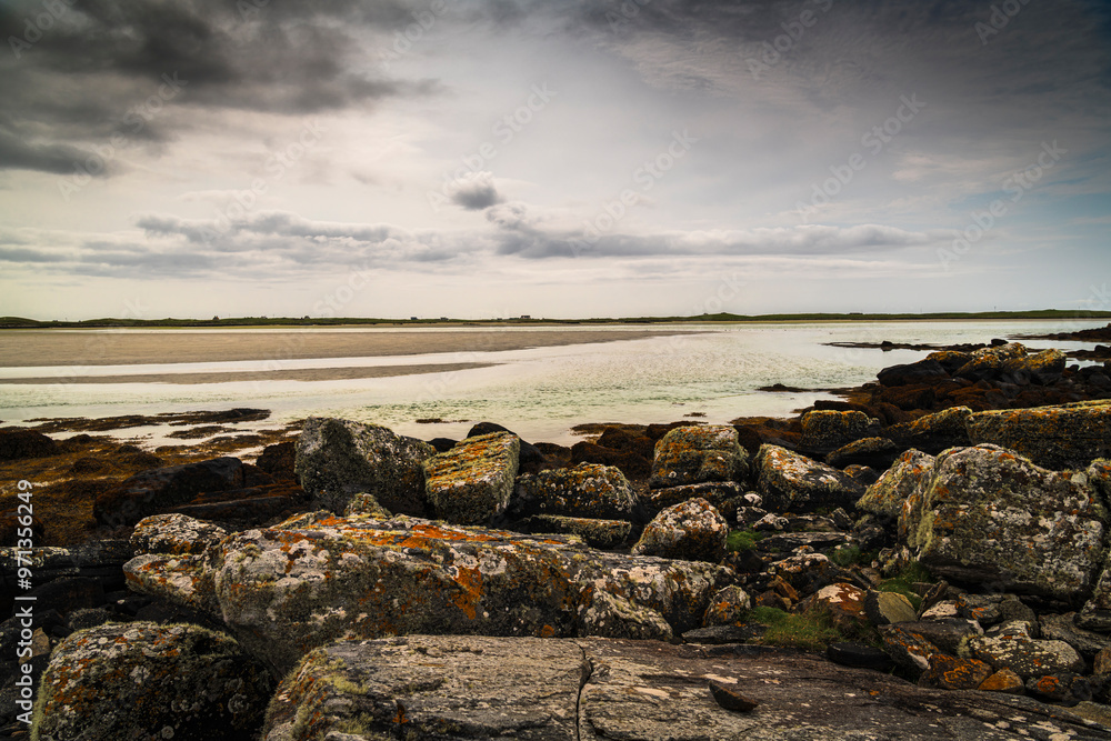 An overcast, summer, HDR image of the Claddach Baleshare coastline at low tide on North Uist, Outer Hebrides, Scotland. An overcast, summer, HDR image of the Claddach Baleshare coastline at low tide on North Uist, Outer Hebrides, Scotland.