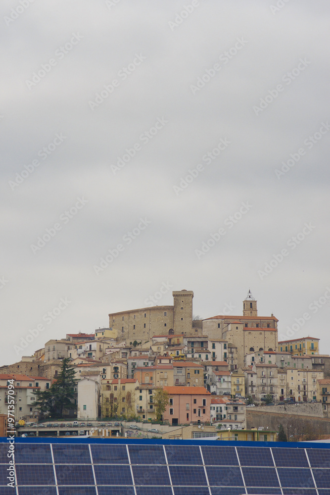 Obraz premium The village of Casoli and in the foreground a structure of photovoltaic panels