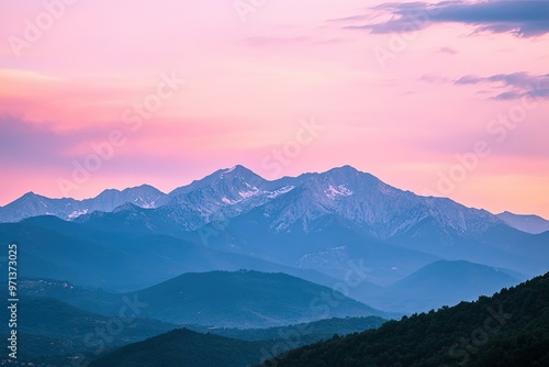 a view of a mountain range at sunset