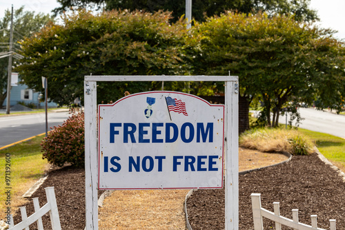 Crisfield, Maryland, USA A sign on the main road says Freedom is not free. photo