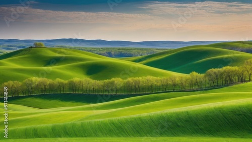Lush green hills under a serene sky, showcasing the beauty of nature's landscape.