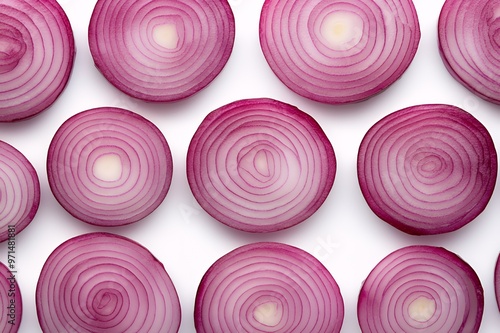 A collection of red onion slices arranged on a white background.