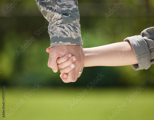 Holding hands, soldier and closeup of family, love and bonding with child, reunion or return from military. Support, uniform and person with kid, nature and care of veteran, youth or father from army