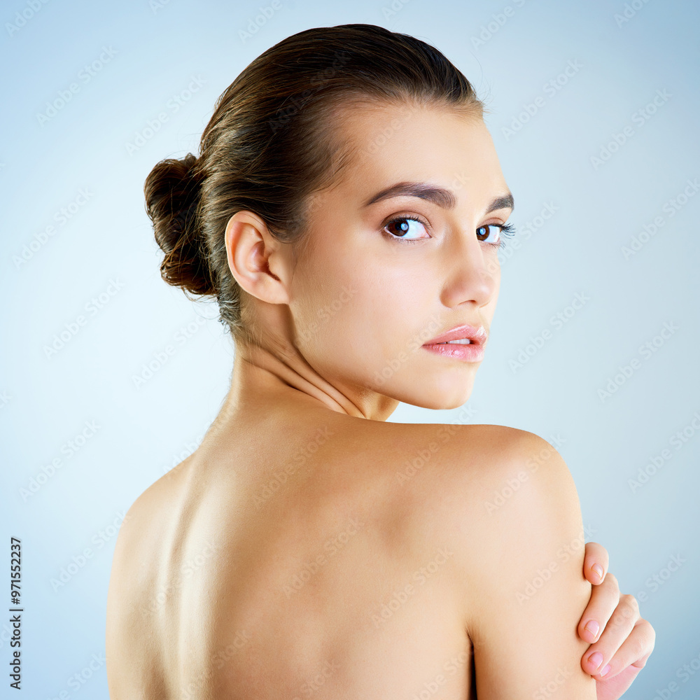 Beauty, natural and portrait of woman in studio for cosmetics, collagen and facial. Self care, glow and shine with face of female model on blue background for clean skincare, makeup and spa. Beauty, natural and portrait of woman in studio for cosmetics, collagen and facial. Self care, glow and shine with face of female model on blue background for clean skincare, makeup and spa.